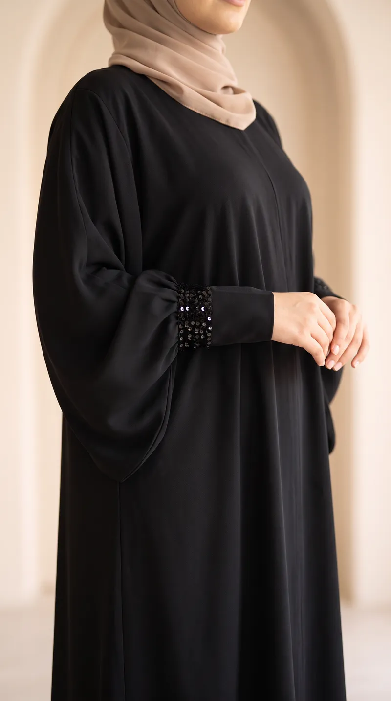 عباية غيمة السوداء — الكمّ عن قرب